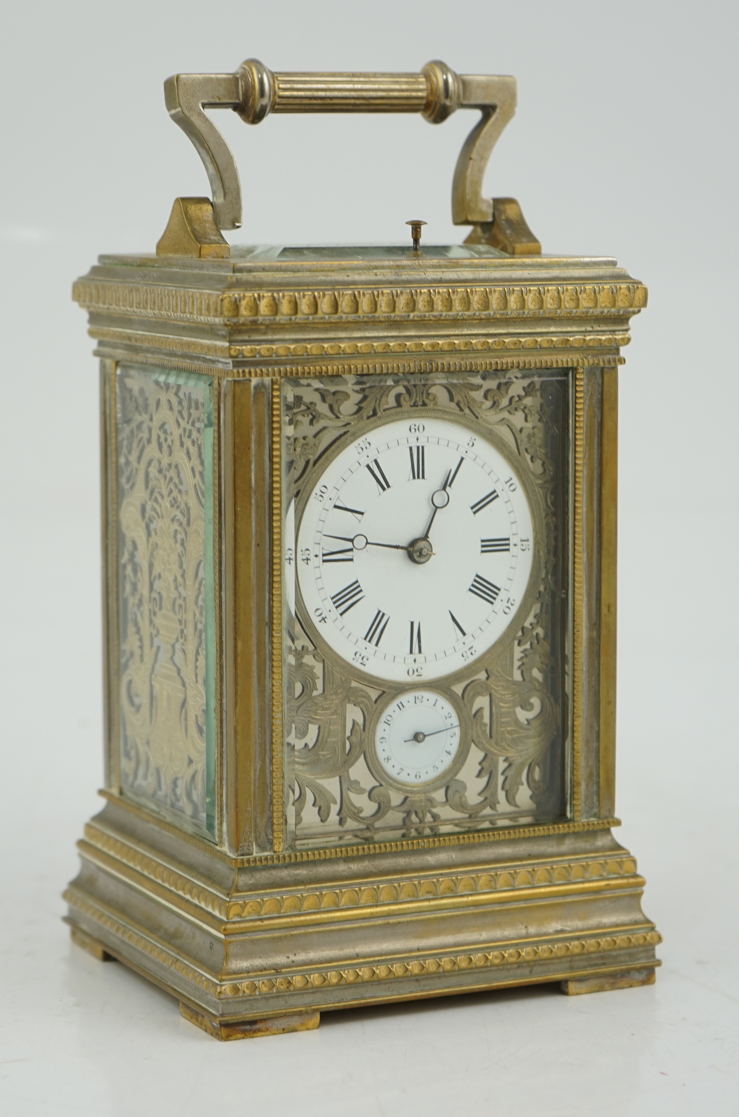 An early 20th century French silvered brass grand sonnerie alarum carriage clock